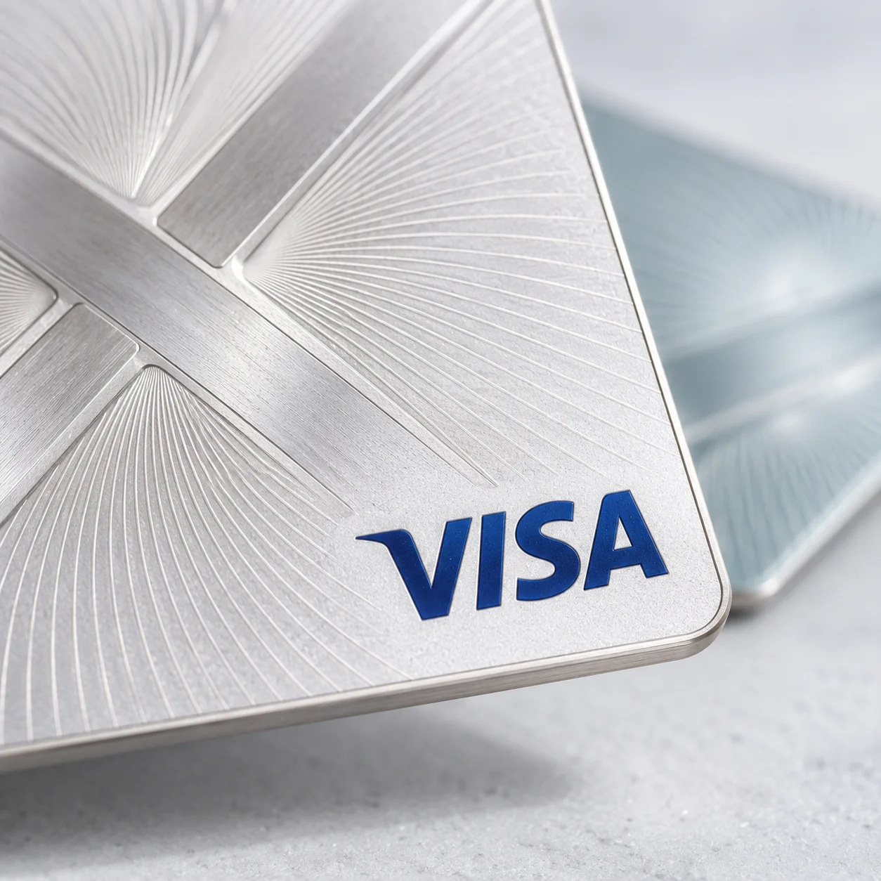 Close-up concept of a pearl LDB-X card with the Visa network mark